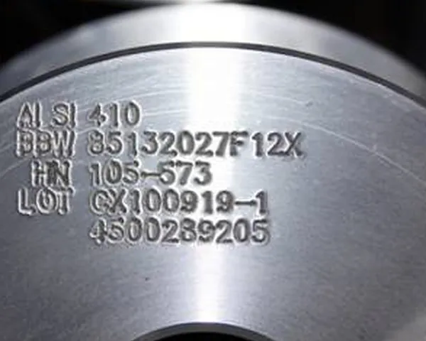 Low-Stress Computer Marking — Grade, heat number and lot number marked on every piece at Jiangnan Metal quality lab