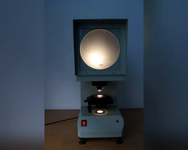CST-50 Notch Projector — Optical inspection of Charpy impact specimen notches at Jiangnan Metal quality lab